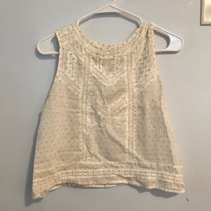 Cream tank with lace detail and blue embroidery
